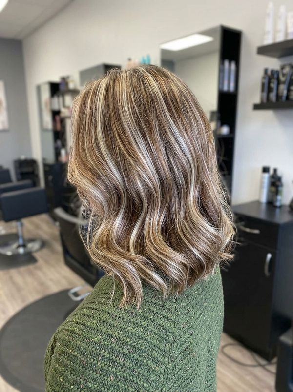 Women's haircut styled at Dynamic Stylz Salon